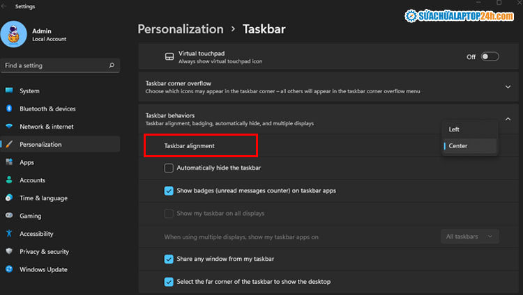 Nhấn vào mục Taskbar behaviors