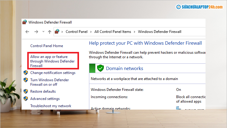 Chọn Allow an app or feature through Windows Defender Firewall
